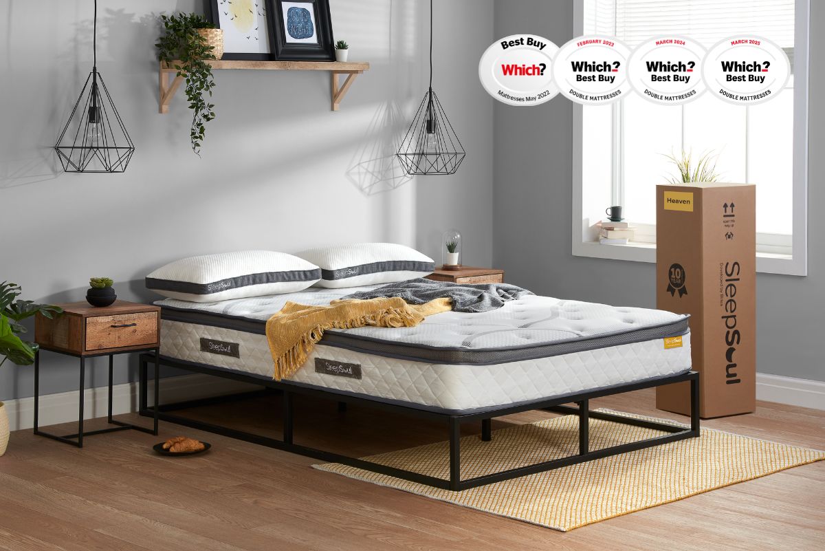 SleepSoul Heaven 1000 pocket spring coolgel mattress on black metal bed, in minimalist bedroom with wood and metal side tables, hanging lamps, shelf, plants and window light, with mattress box